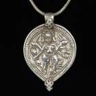 AMULETS + PENDANTS